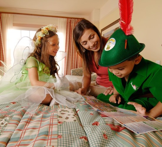 Family looking at a map at a Disney resort
