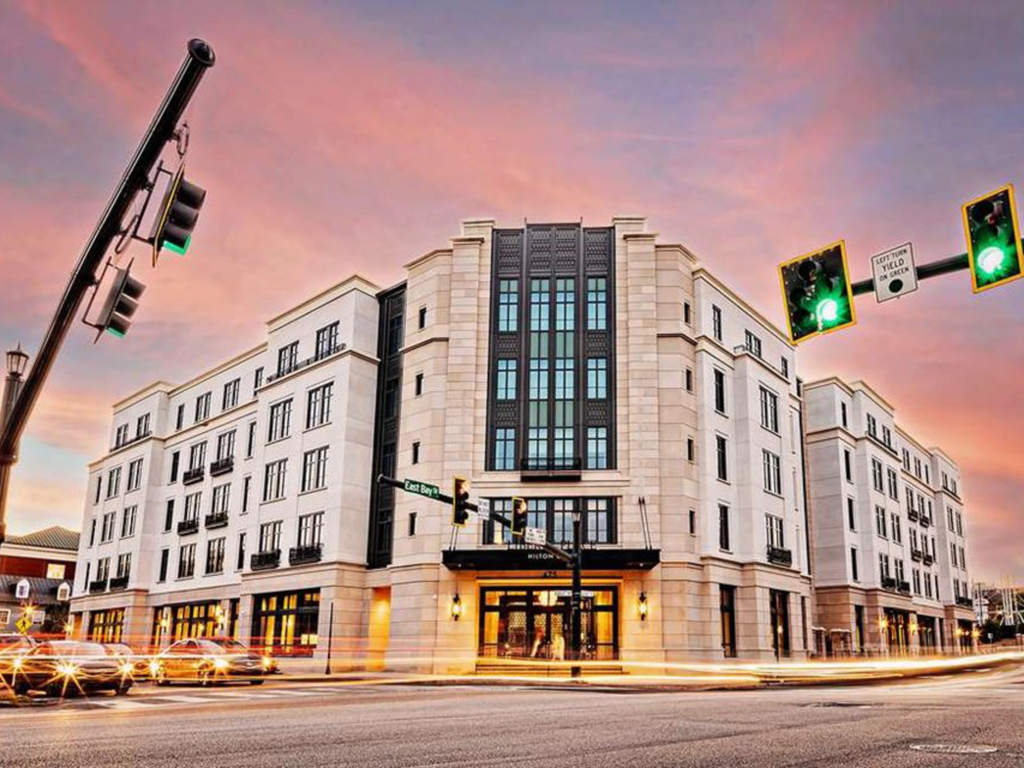 Exterior of Liberty Place Charleston at sunset, a prime spot to use Hilton timeshare financing.