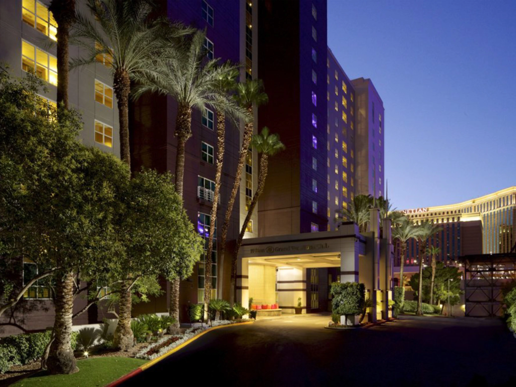 Driveway entrance to the Flamingo resort at night, perfect for guests utilizing Hilton timeshare financing.