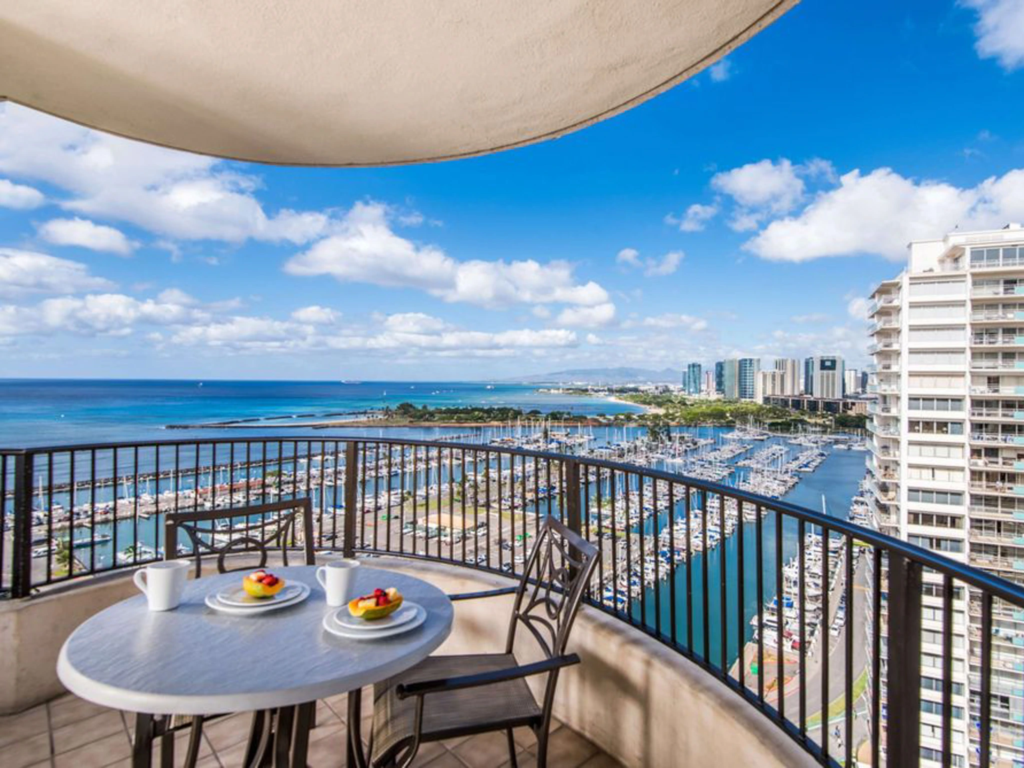 Balcony ocean and marina view at Kalia Suites. Explore Hilton timeshare financing to make this yours.