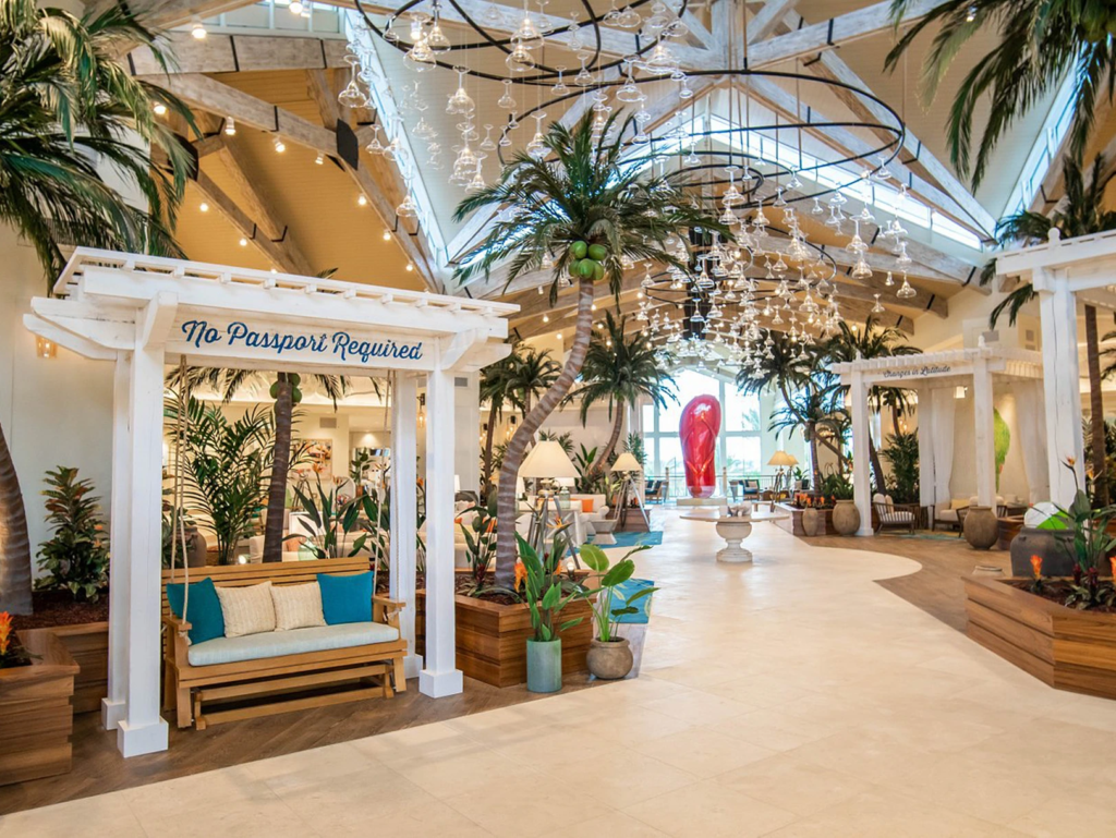 Lobby at Margaritaville Resort Orlando with a giant flip-flop and swing, a fun destination to sell wyndham timeshare.