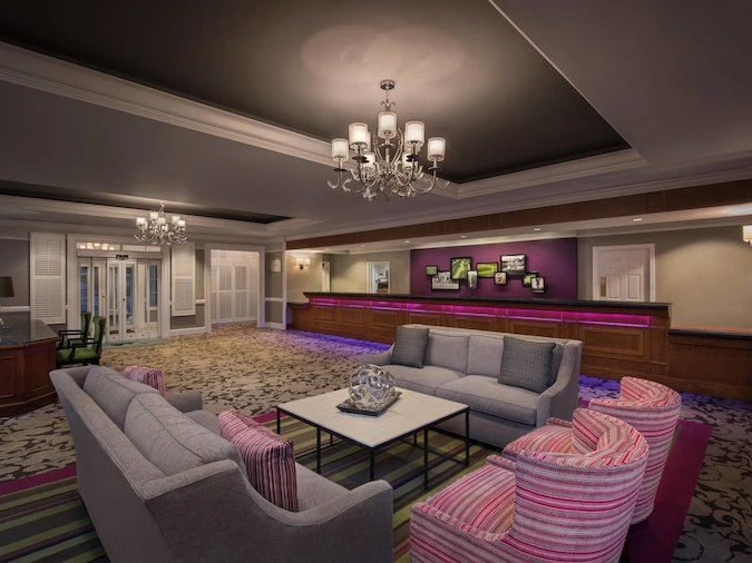 Elegant resort lobby with chandeliers and stylish seating at Marriott's Fairway Villas at Seaview.