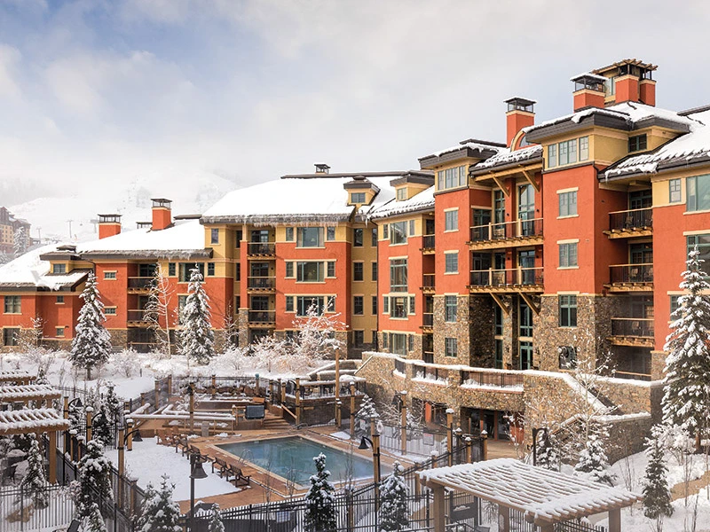 Snowy winter view of the outdoor pool at Park City, a factor in the Club Wyndham vs WorldMark debate.