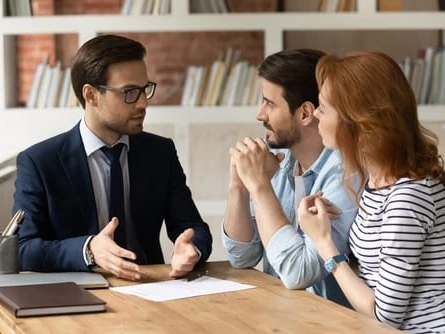 Can You Refuse to Inherit Timeshare? Couple Talking to a Lawyer