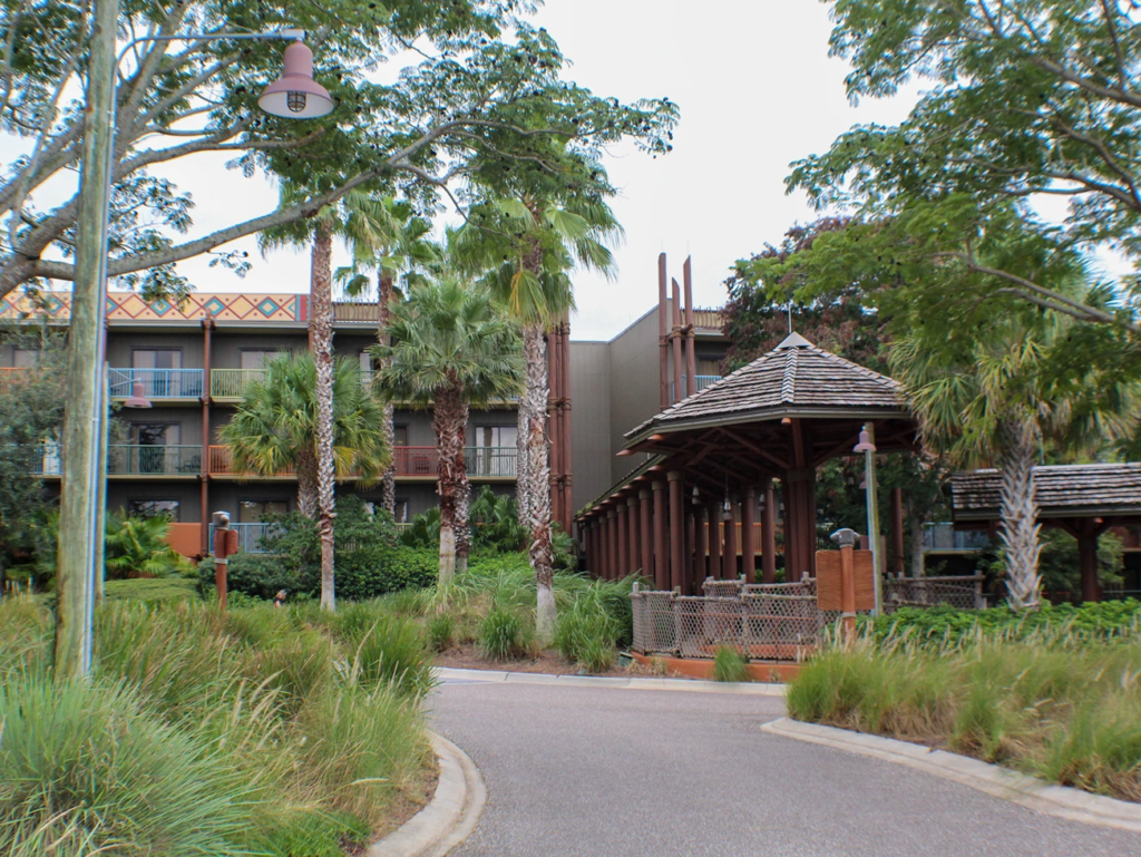 Resort exterior and covered walkway, showing property upkeep that impacts animal kingdom lodge dvc resale value.