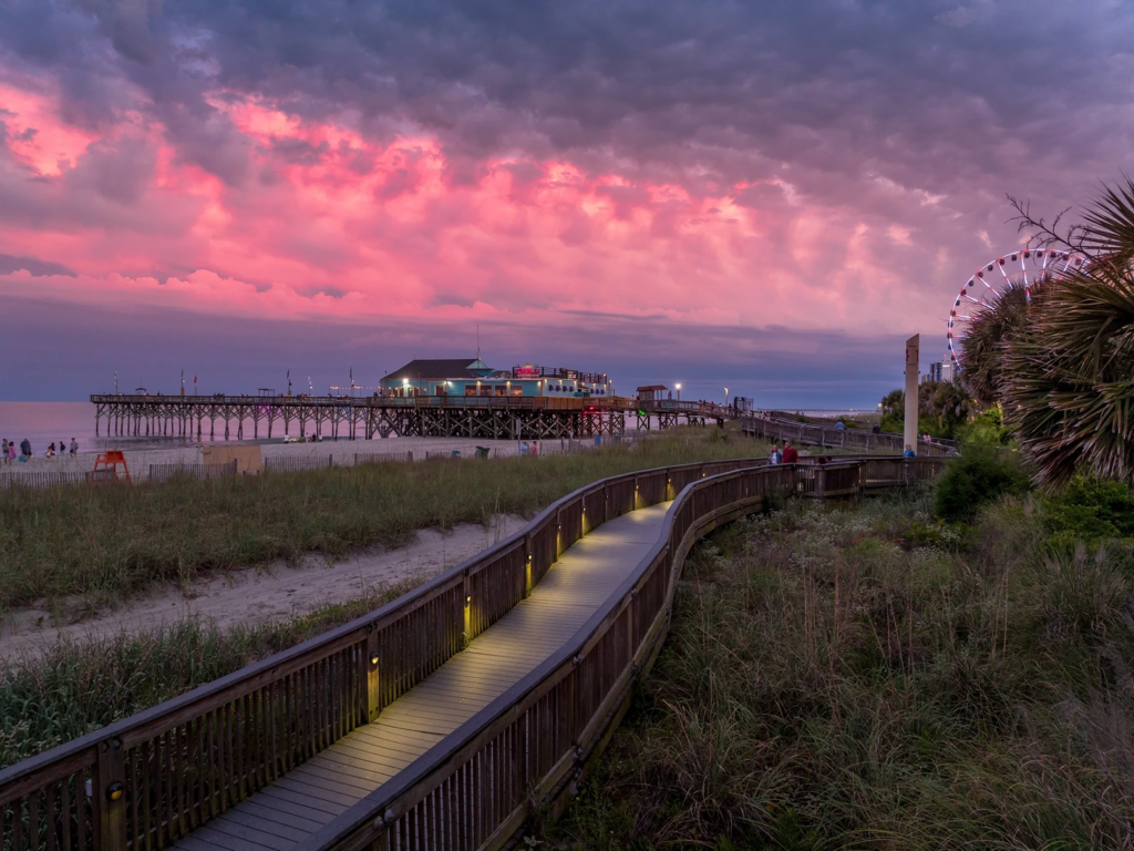 A scenic oceanfront pier and boardwalk in Myrtle Beach, perfect for labor day travel.