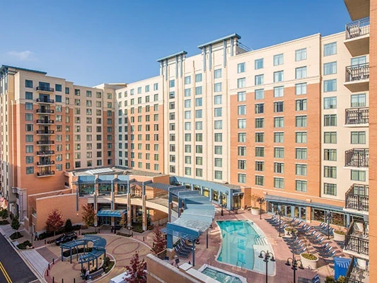 Courtyard pool and exterior of Club Wyndham National Harbor, a wonderful resort stay for labor day travel.