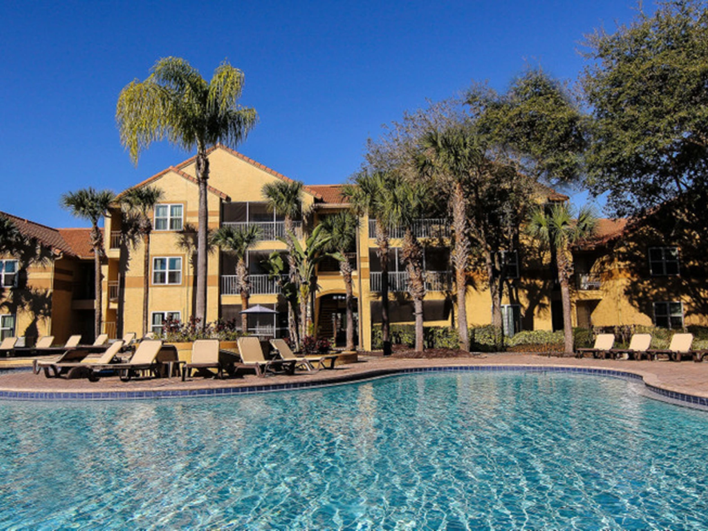 A large sparkling swimming pool at Westgate Blue Tree Resort, a key feature for westgate timeshare resale value.