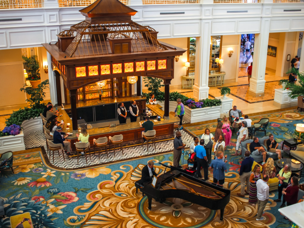 Grand Floridian Resort lobby with a grand piano and ornate bar gazebo, one of the Disney Vacation Club resorts DVC resale companies handle contracts for.